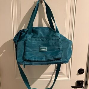 New never used Foldie travel bag teal